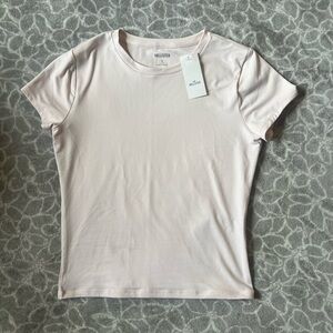 NWT light pink Hollister baby tee